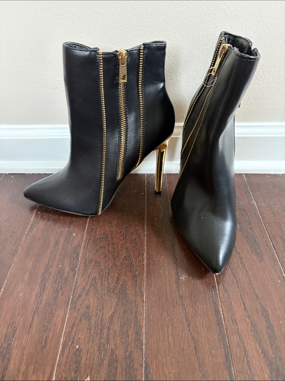 Sleek Black Pointed-Toe Stiletto Ankle Boots with Gold Zippers- Nicole Miller 9